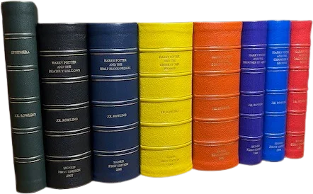 The complete set of nine volumes, each in its custom traycase